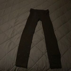 Black, polka dotted leggings. No Boundaries size 4.